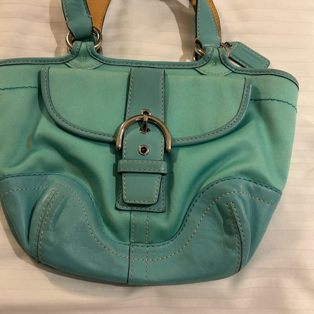 Coach Blue Shoulder Bag with Decorative Buckle coach tag inside and outside.